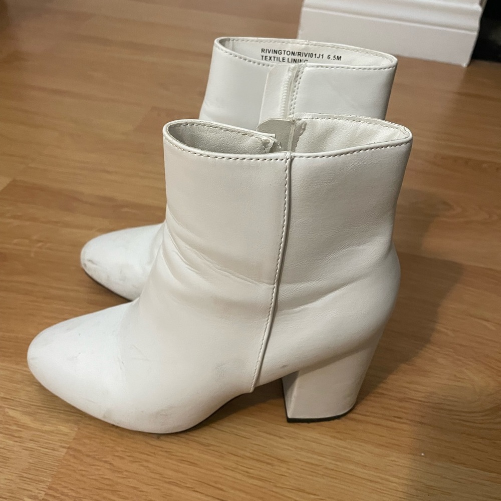 White heeled boots. Worn 1 time